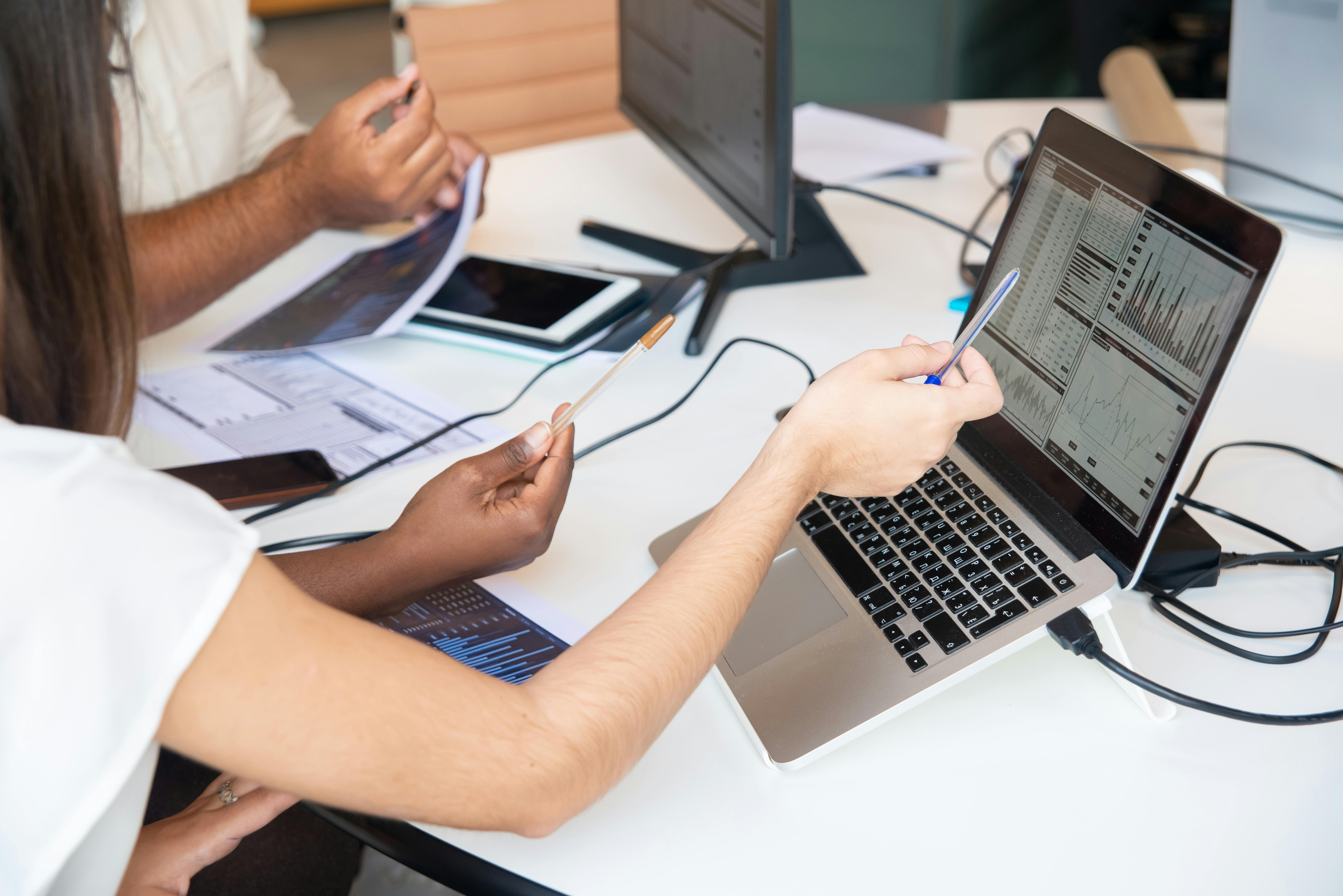 Team reviewing network and infrastructure monitoring dashboards in an enterprise setting